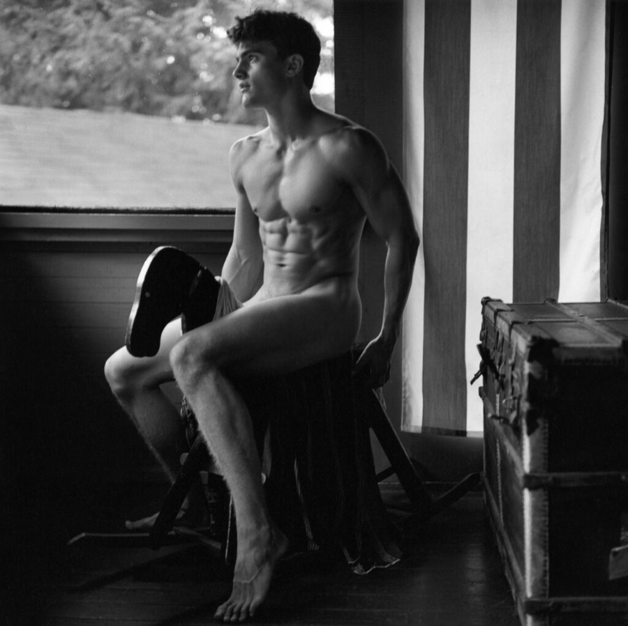 Bruce Weber, Peter Johnson on rocking horse, Camp Longwood, Adirondacks, 1999