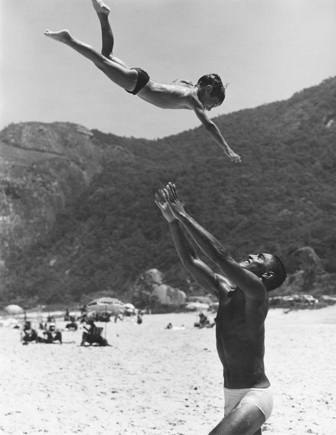 Bruce Weber, Rickson Gracie and his son Rawkson, Prainha Beach, Rio, 1986