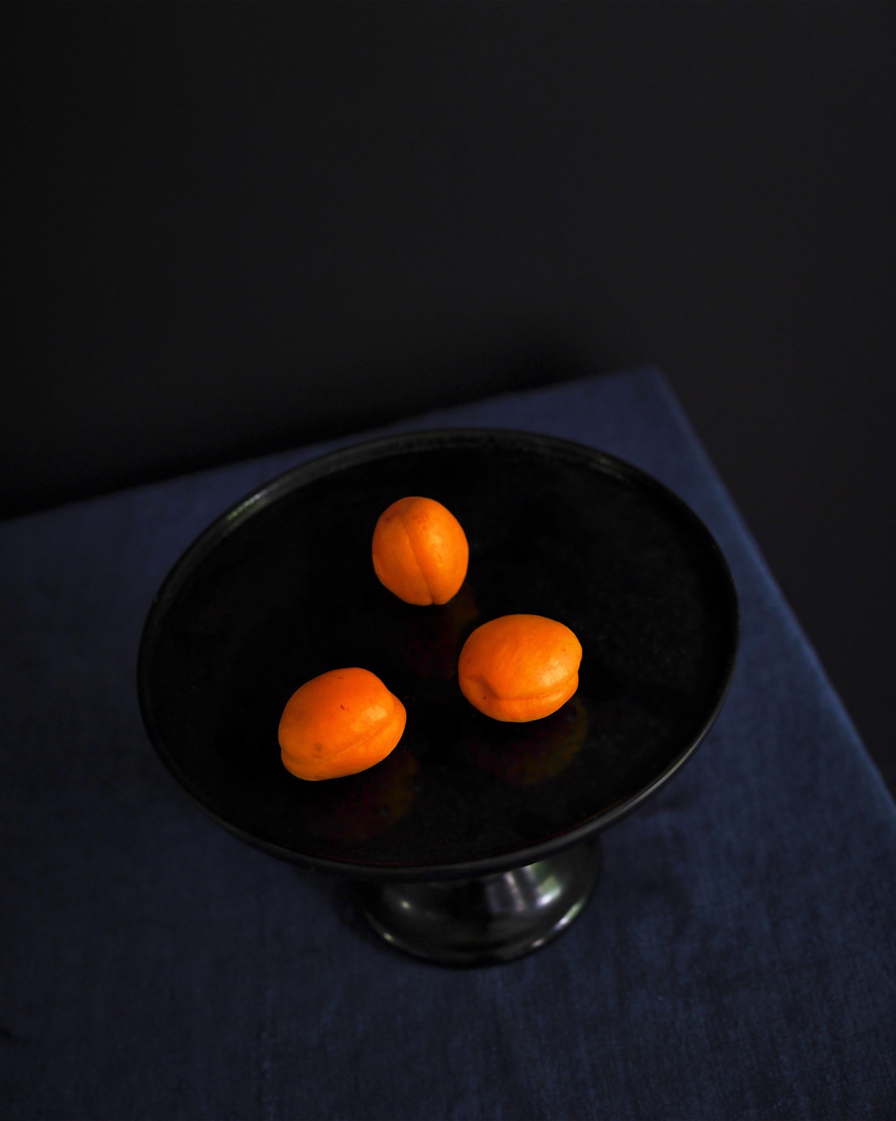 Cig Harvey, Three Apricots (Wet), 2023