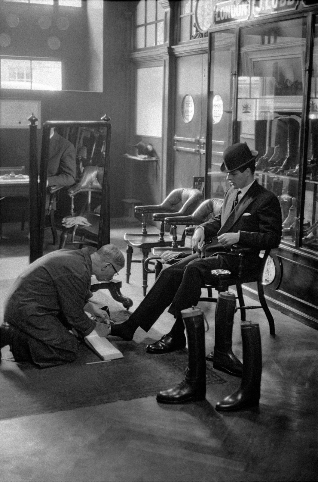 Frank Horvat, Customer at Lobb's shoe shop, London, 1959