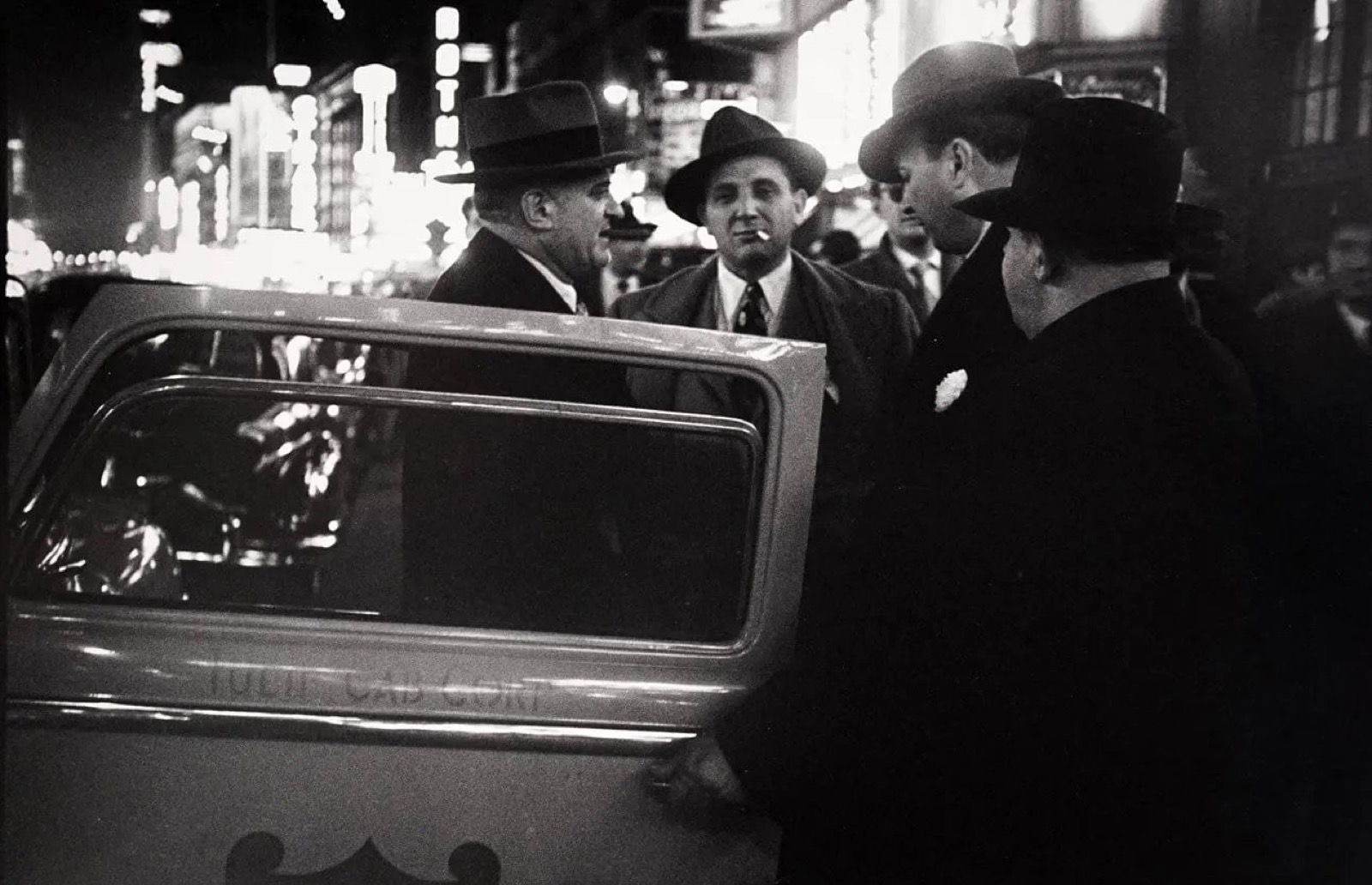 Louis Faurer, Untitled, New York City (four men with cab door), 1950